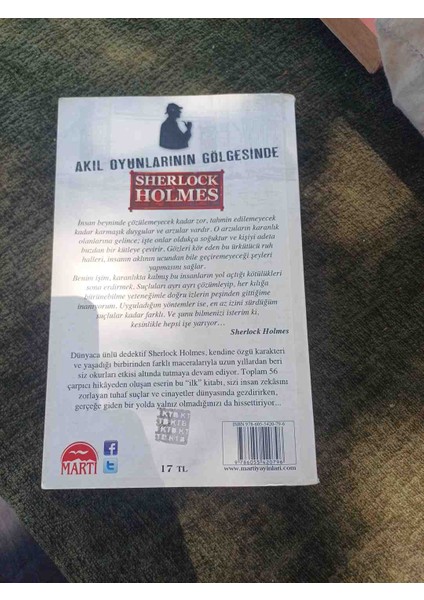 Sir Arthur Conan Doyle'un Sherlock Holmes Serisinden Akıl Oyunlarının Gölgesinde Adlı Polisiye Kitap. Çevirmen: Canber Mustafaoglu 2012 Basim 395 Sayfa. ️‍♂️