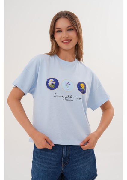 Mavi Kadın Oversize Çiçek Everything Is Possible Baskılı Tişört fiyatları