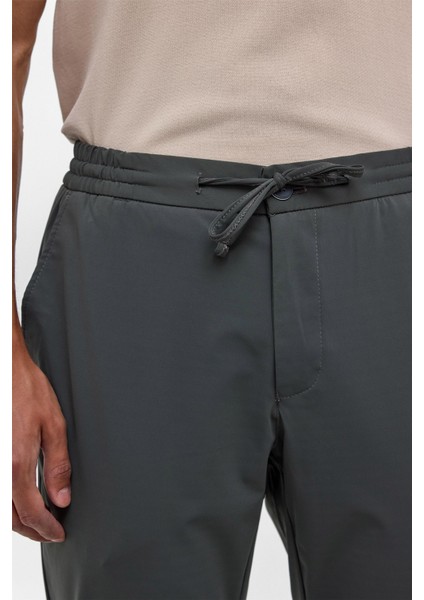 Koyu Haki Slim Armürlü Jogger Pantolon fırsatları