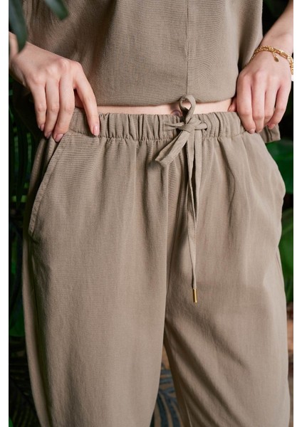 Beli Lastikli ve Bağcıklı Cepli Mom Fit Kadın Keten Havuç Pantolon Yeşil fiyatları