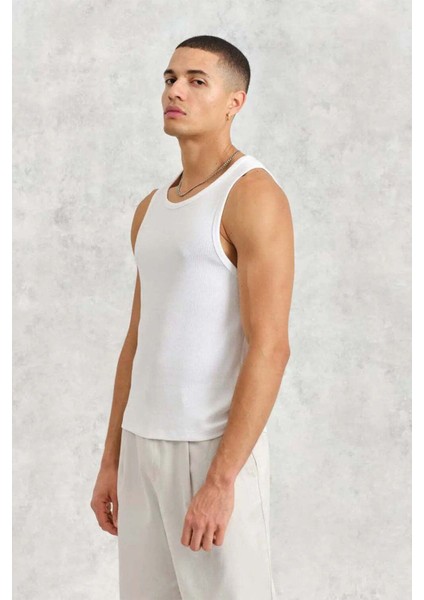 Montague Beyaz Yelek: Rahat ve Şık Katmanlama Seçeneği fiyatları