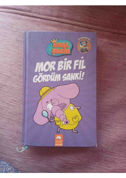 Kral Şakir Serisinden 'mor Bir Fil Gördüm Sanki!' Adlı Çocuk Kitabı, Mor Fil Karakterini Eğlenceli Şekilde Anlatıyor. Kral Şakir 7 - Mor Bir Fil Gördüm Ilk Sayfada Isim Yaziyor Harici Cok Iyi Durumda