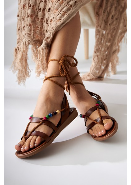 Nina Taba Boncuk Detaylı Bilekten Bağlamalı Parmak Arası Kadın Sandalet modelleri