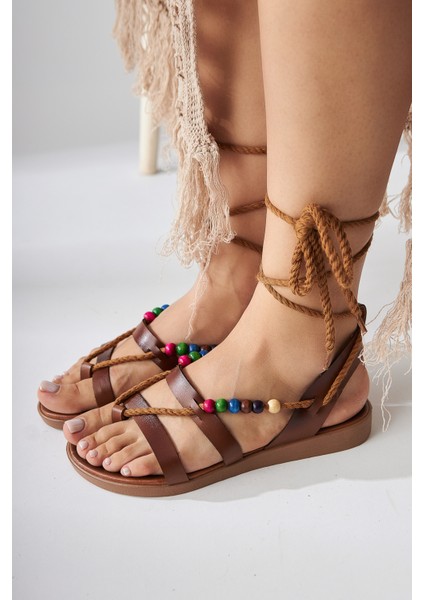 Nina Taba Boncuk Detaylı Bilekten Bağlamalı Parmak Arası Kadın Sandalet indirimleri