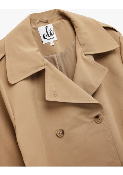 Uzun Kollu Düğmeli Kemer Detaylı Cepli Kruvaze Yaka Trençkot modelleri