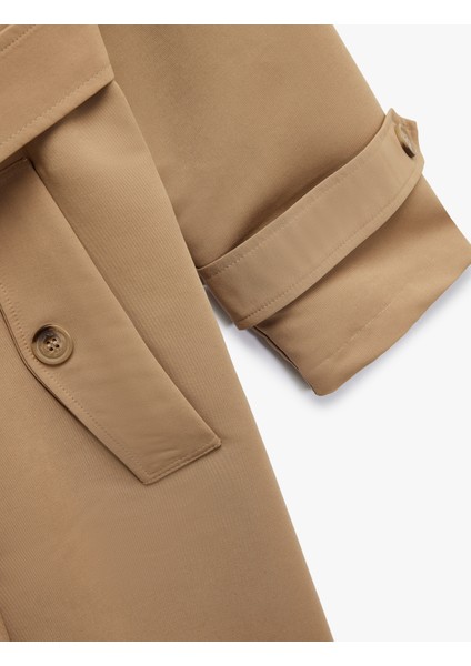 Uzun Kollu Düğmeli Kemer Detaylı Cepli Kruvaze Yaka Trençkot indirimleri