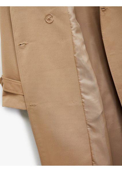 Uzun Kollu Düğmeli Kemer Detaylı Cepli Kruvaze Yaka Trençkot fırsatları