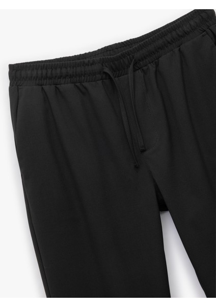 Beli Bağcıklı Katlamalı Paça Cep Detaylı Slim Fit Pantolon indirimleri