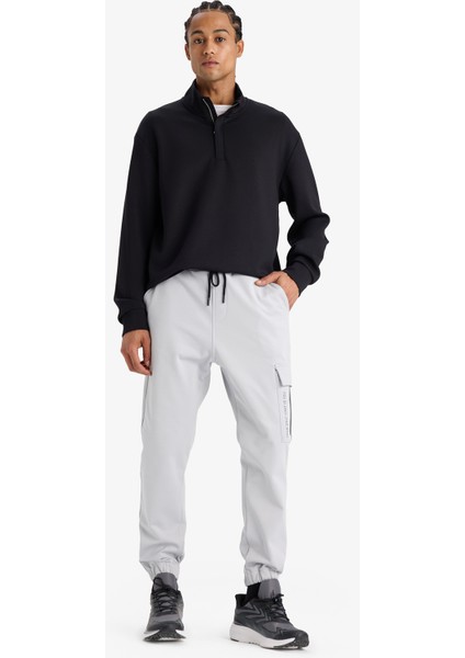 Fit Sporcu Jogger Eşofman Altı Standart Fit Üç Cepli Beli Bağcıklı Lastikli Paça D3741AX24WN fiyatları