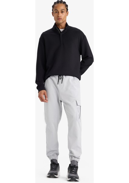 Fit Sporcu Jogger Eşofman Altı Standart Fit Üç Cepli Beli Bağcıklı Lastikli Paça D3741AX24WN fırsatları