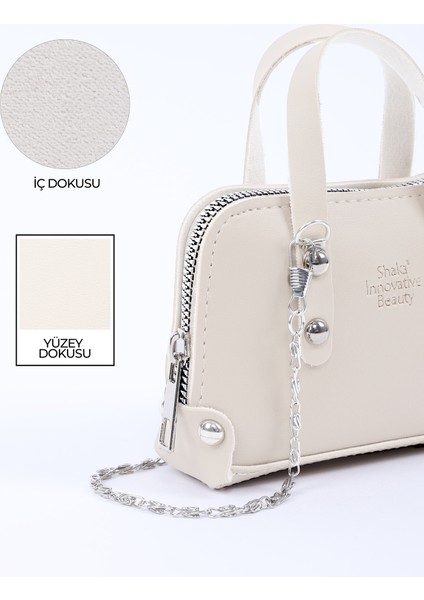 Krem SHK224 Suni Deri Mini Boy Fermuarlı Tek Bölmeli Zincirli El. Kol ve Omuz Çantası indirimleri