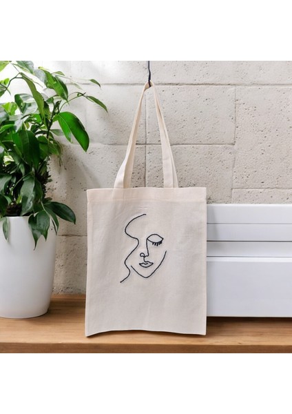 Göksunun Izi - Minimal Yüz Figürlü Punch Bez Çanta – Sanatsal Çizgilerle El Yapımı Minimalist Omuz Çantası