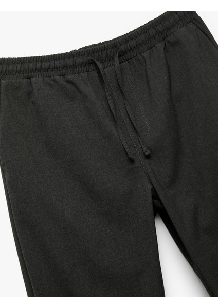 Beli Bağcıklı Katlamalı Paça Cep Detaylı Slim Fit Pantolon indirimleri