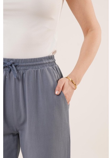 Cepli Belden Bağlamalı Paça Detaylı Indigo Pantolon modelleri