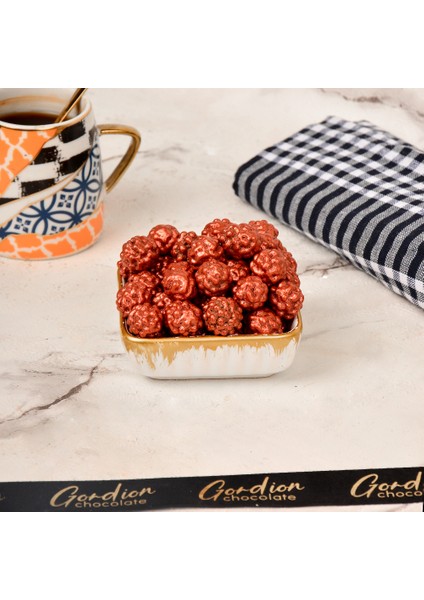 Gordion Çıtır Lezzet Bombası: Bronz Leblebili Draje 500 gr - Geleneksel ve Modern Tatların Buluşması!