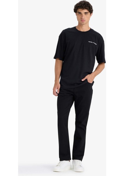 %100 Pamuk Boxy Fit Rahat Kesim Bisiklet Yaka Sırt Baskılı Kısa Kollu Tişört F8327AX25AU fiyatları