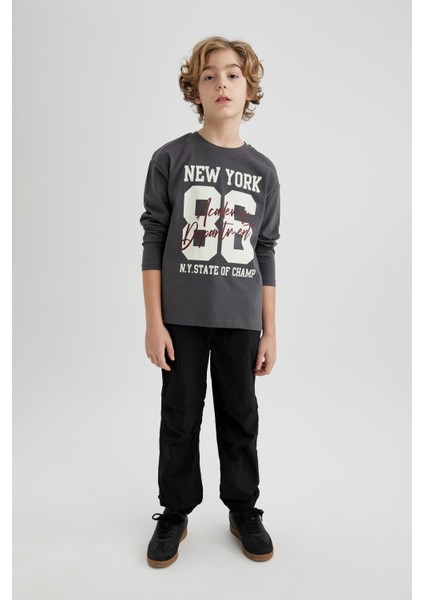 Erkek Çocuk Beli ve Paçası Lastikli Cepli Siyah Jogger Paraşüt Basic Düz Pantolon B6602A824SM modelleri