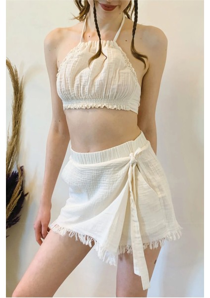 Müslin Yandan Bağlama Detaylı Püsküllü Şort Etek fiyatları