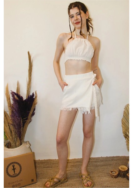 Müslin Yandan Bağlama Detaylı Püsküllü Şort Etek fırsatları