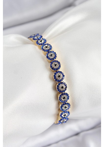 Pirinç Zirkon Taşlı Lacivert Nazar Model Gold Renk Lastikli Kadın Bileklik - TJ-BB7495