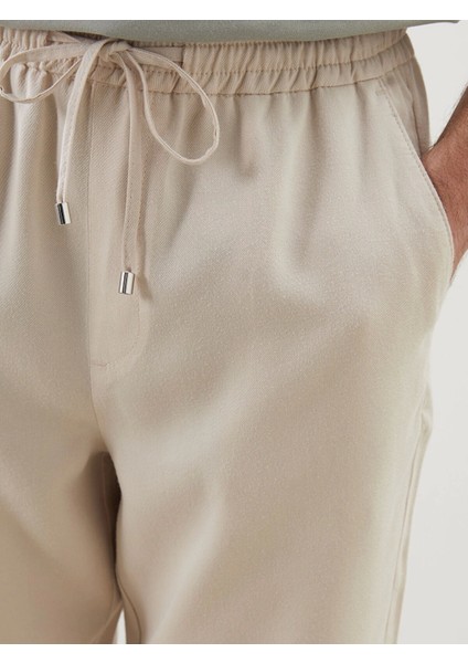 Lcw Vision Bej Standart Kalıp Beli Lastikli Erkek Pantolon modelleri
