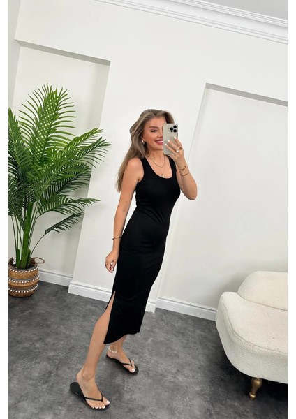 Ipeksi Kadın Çift Yırtmaç Detaylı Sıfır Kol Midi Boy Elbise indirimleri