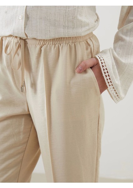 Lcw Modest Bej Beli Lastikli Havuç Kesim Kadın Pantolon fırsatları