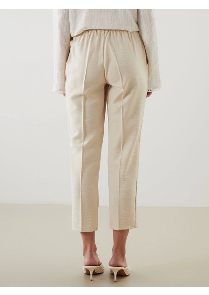 Lcw Modest Bej Beli Lastikli Havuç Kesim Kadın Pantolon indirimleri