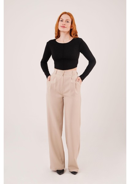 Ipeksi Bol Paça Piliseli Bej Pantolon fiyatları