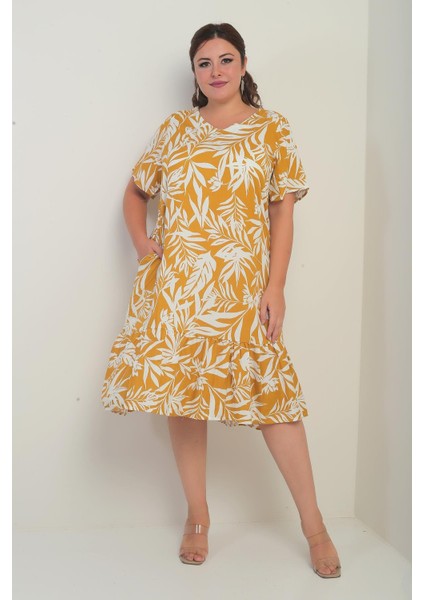Kadın V Yaka Karışık Yaprak Desenli Cepli Eteği Fırfırlı Büyük Beden Elbise modelleri