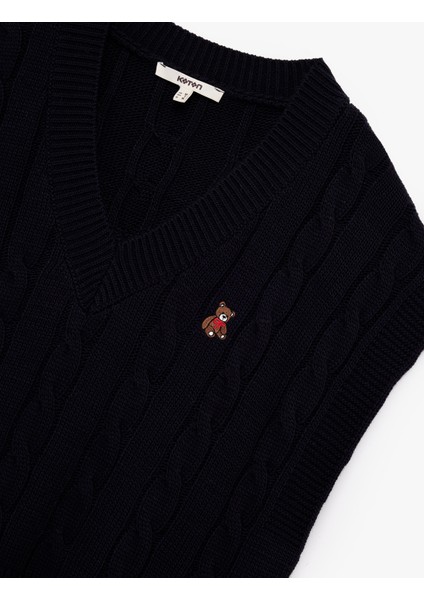 Kolsuz V Yaka Ayıcık Işleme Detaylı Saç Örgü Oversize Süveter indirimleri