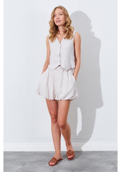 Kadın Açık Bej Beli Lastikli Stoplu Bolon Şort Etek modelleri