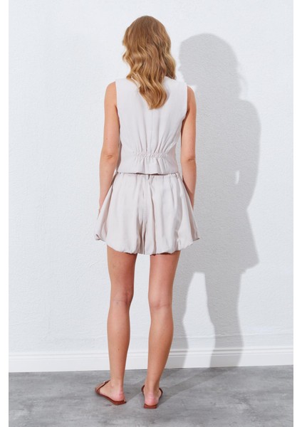 Kadın Açık Bej Beli Lastikli Stoplu Bolon Şort Etek indirimleri