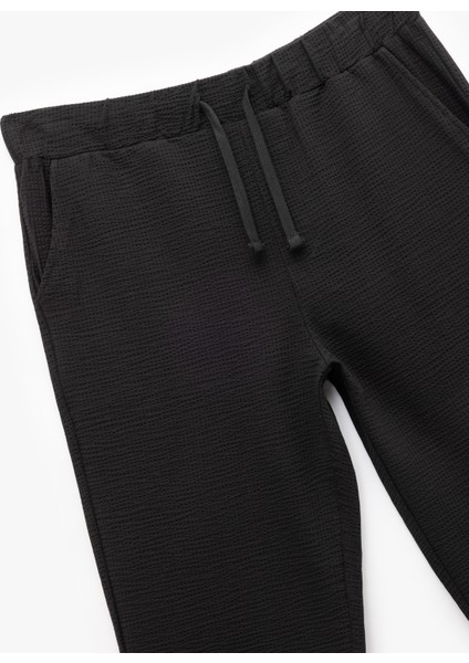 Pamuklu Dokulu Cep Detaylı Beli Bağcıklı Eşofman Altı indirimleri