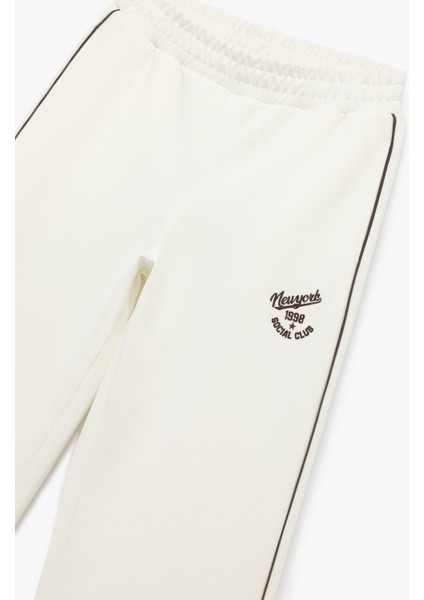 Pamuklu Şardonlu Biyeli Baskılı Beli Lastikli Geniş Paça Eşofman Altı modelleri