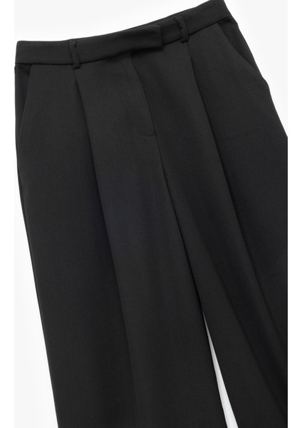 Pile Detaylı Cepli Yüksek Bel Palazzo Kumaş Pantolon modelleri