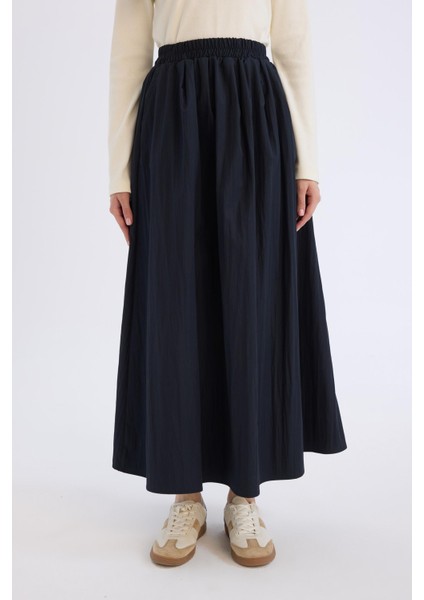 A Kesim Esnek Belli Paraşüt Kumaş Maxi Tesettür Etek