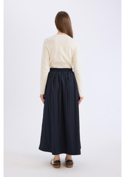 A Kesim Esnek Belli Paraşüt Kumaş Maxi Tesettür Etek