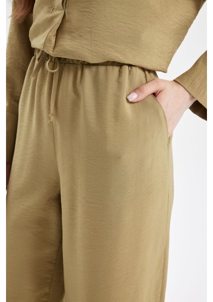 Wide Leg Geniş Bol Paça Beli Lastikli Bağcıklı Basic Düz Pantolon D4148AX24AU fırsatları