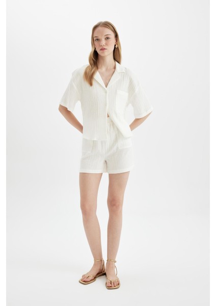 Regular Fit Normal Bel Kısa Paça Müslin Şort Y0996AZ24HS fiyatları