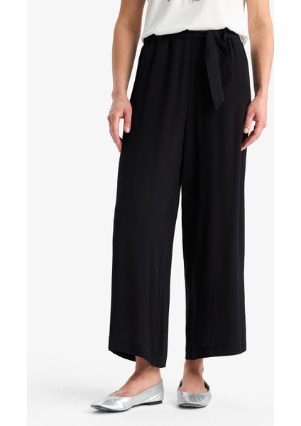 Culotte Esnek Belli Geniş Paça Kuşaklı Krinkıl Viskon Kapri Pantolon C9565AX25SM fırsatları