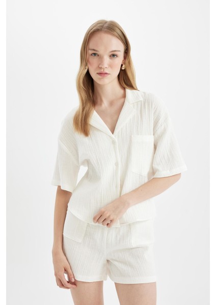 Regular Fit Normal Bel Kısa Paça Müslin Şort Y0996AZ24HS modelleri