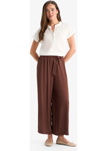 Culotte Esnek Belli Geniş Paça Kuşaklı Krinkıl Viskon Kapri Pantolon C9565AX25SM fırsatları