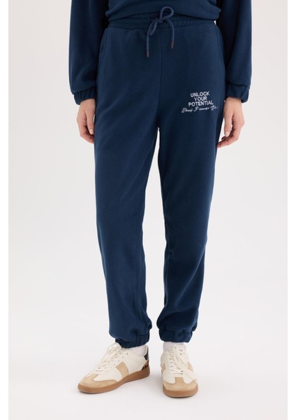 Standart Fit Eşofman Altı Uzun Boy Beli Lastikli Paçası Ayarlanabilir Lastikli Bağcıklı Cepli Baskılı Polar Kumaş Y2650AZ24WN indirimleri