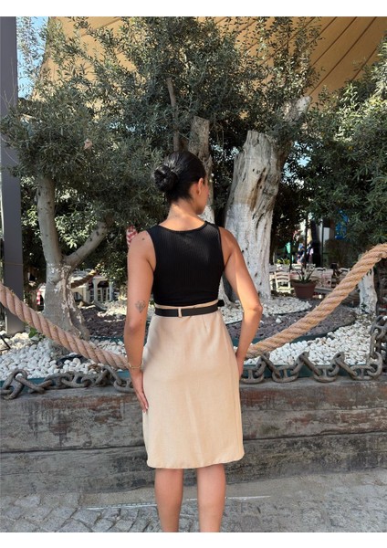 Bej Pileli Kemer Aksesuarlı Etek fiyatları