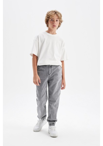 Erkek Çocuk Beli Bağcıklı Cepli Lastikli Paça Jogger Jean Pantolon C4601A824AU modelleri