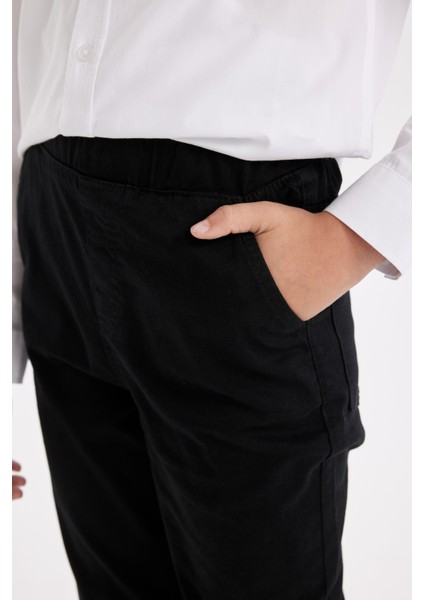 Erkek Çocuk Düz Paça Beli Lastikli Cepli Basic Düz Siyah Gabardin Okul Pantolonu T8850A624AU indirimleri