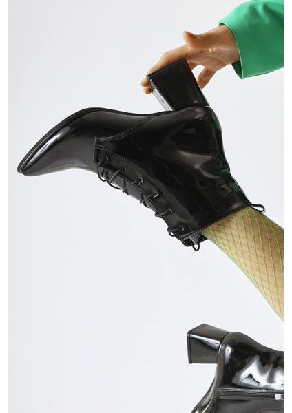 Kalaya Siyah Rugan Sivri Burunlu Fermuarlı Topuklu Bot modelleri