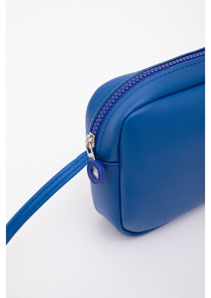 Saks Mavi U23 Suni Deri ,tek Bölmeli, Fermuarlı,süet Iç Kumaş, Ayarlanabilir Askılı, Mini Urban Omuz Çantası