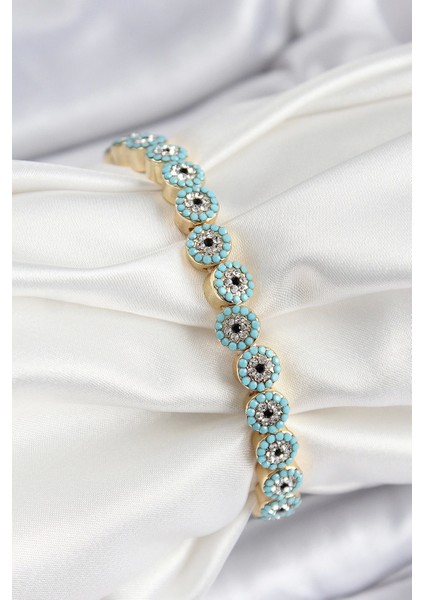 Pirinç Zirkon Taşlı Turkuaz Nazar Model Gold Renk Lastikli Kadın Bileklik